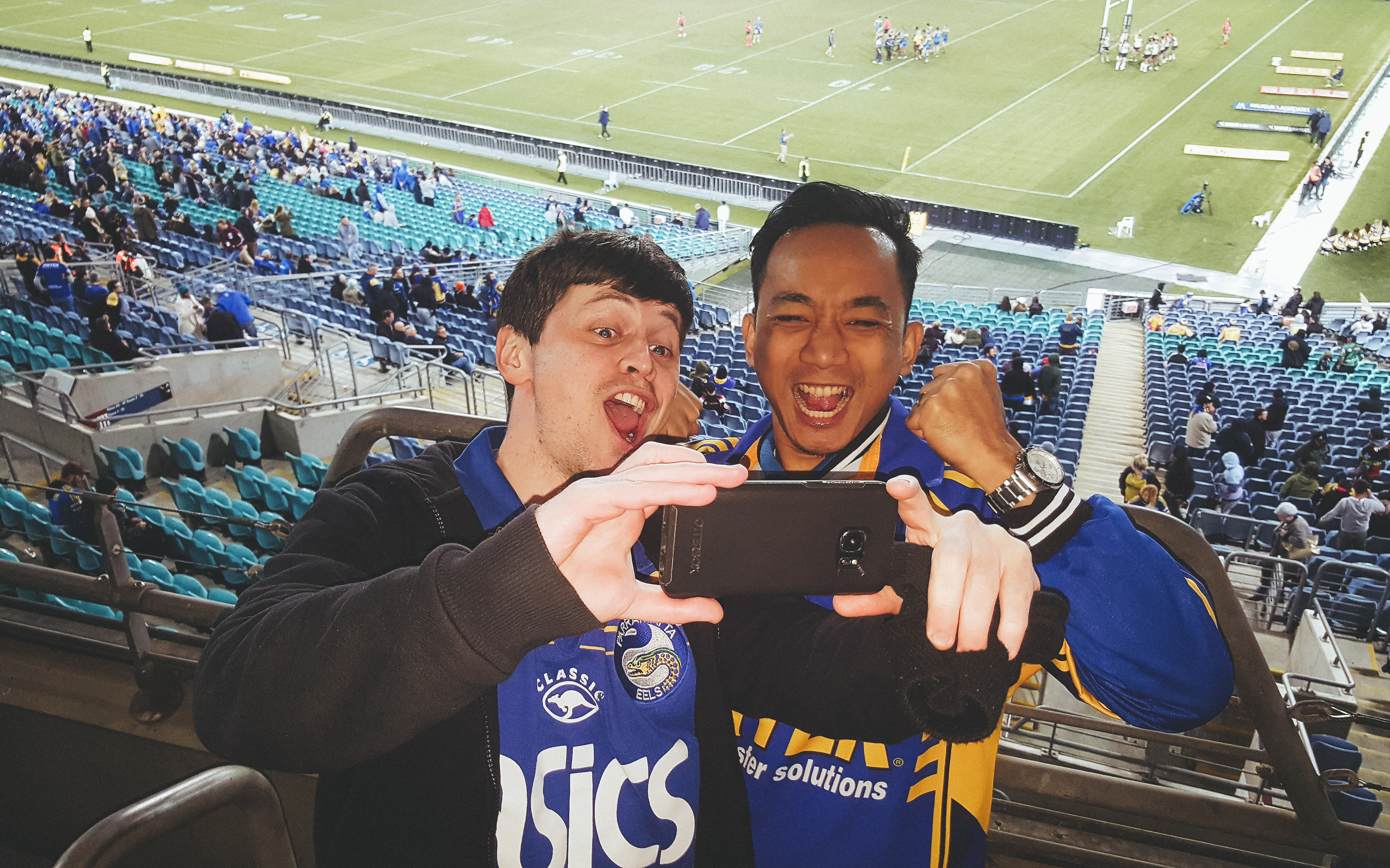 Louie Rosales and Gareth White cheer on the Parramatta Eels