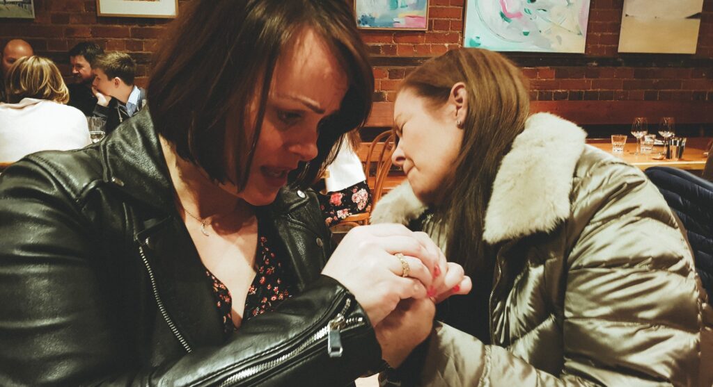 Louise Connolly helping to pick out a painful splinter