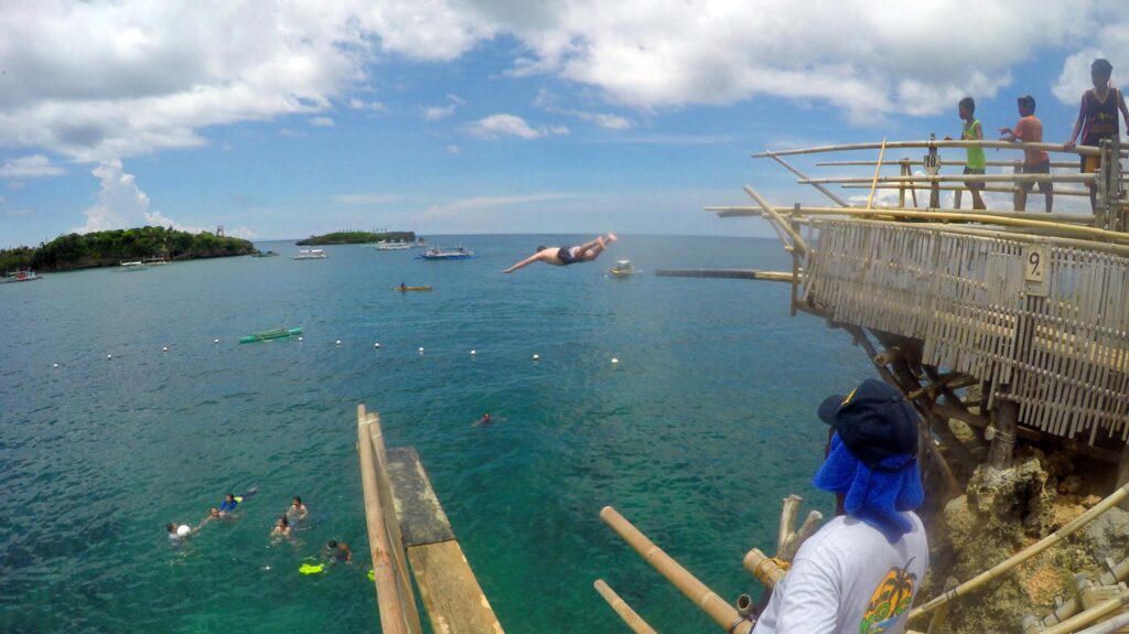 Cliff jumping in Boracay. They call it cliff jumping but it's really just high, dodgy springboards. Great fun and amazing water!