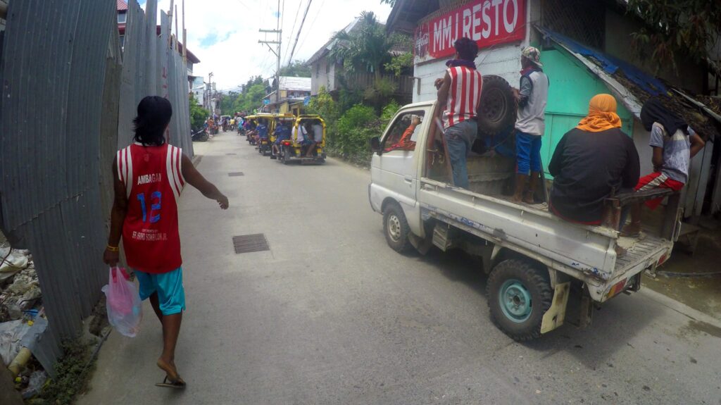 rike jam, dead ahead. This bloke in front of me is our activity vendor, shopping for us to make sure we have our ice, water and beer for the day.— in Boracay, Philippines.