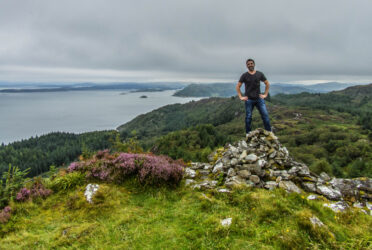 Michael Doig above what remains of the ruins of Castle Dounie above Crinan, Scotland